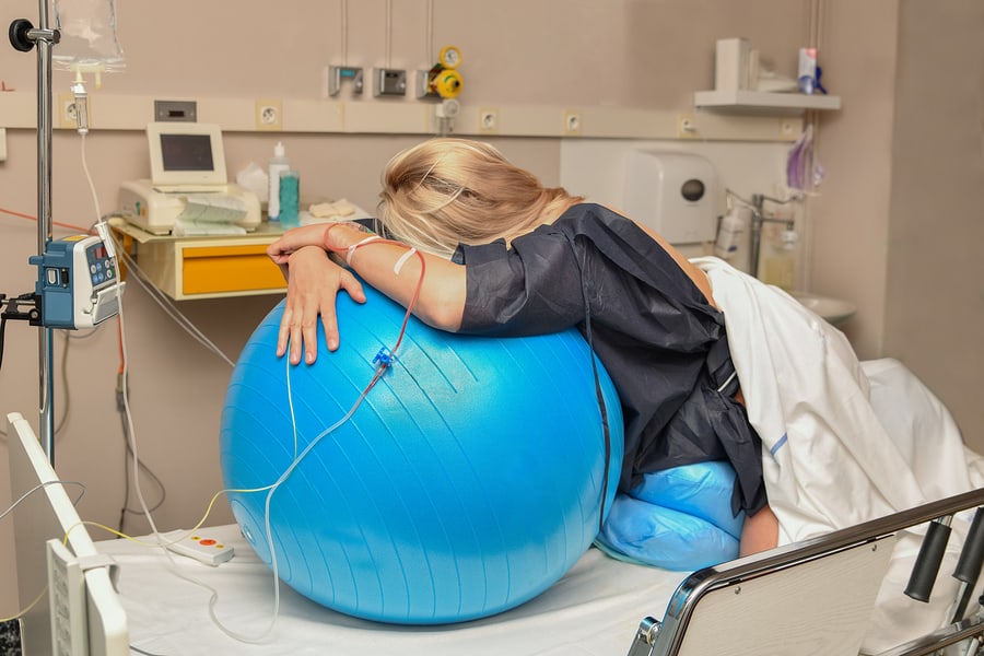 Woman in active labor avoiding fear when it comes to childbirth