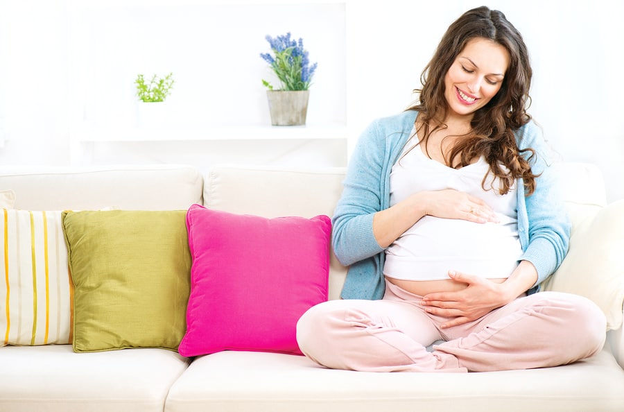 Pregnant woman thinking about her natural birth plan