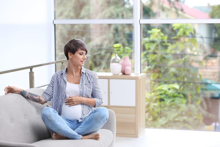 Pregnant woman thinking about her birth plan