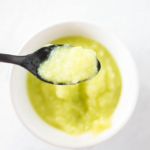 spoon of zucchini baby food